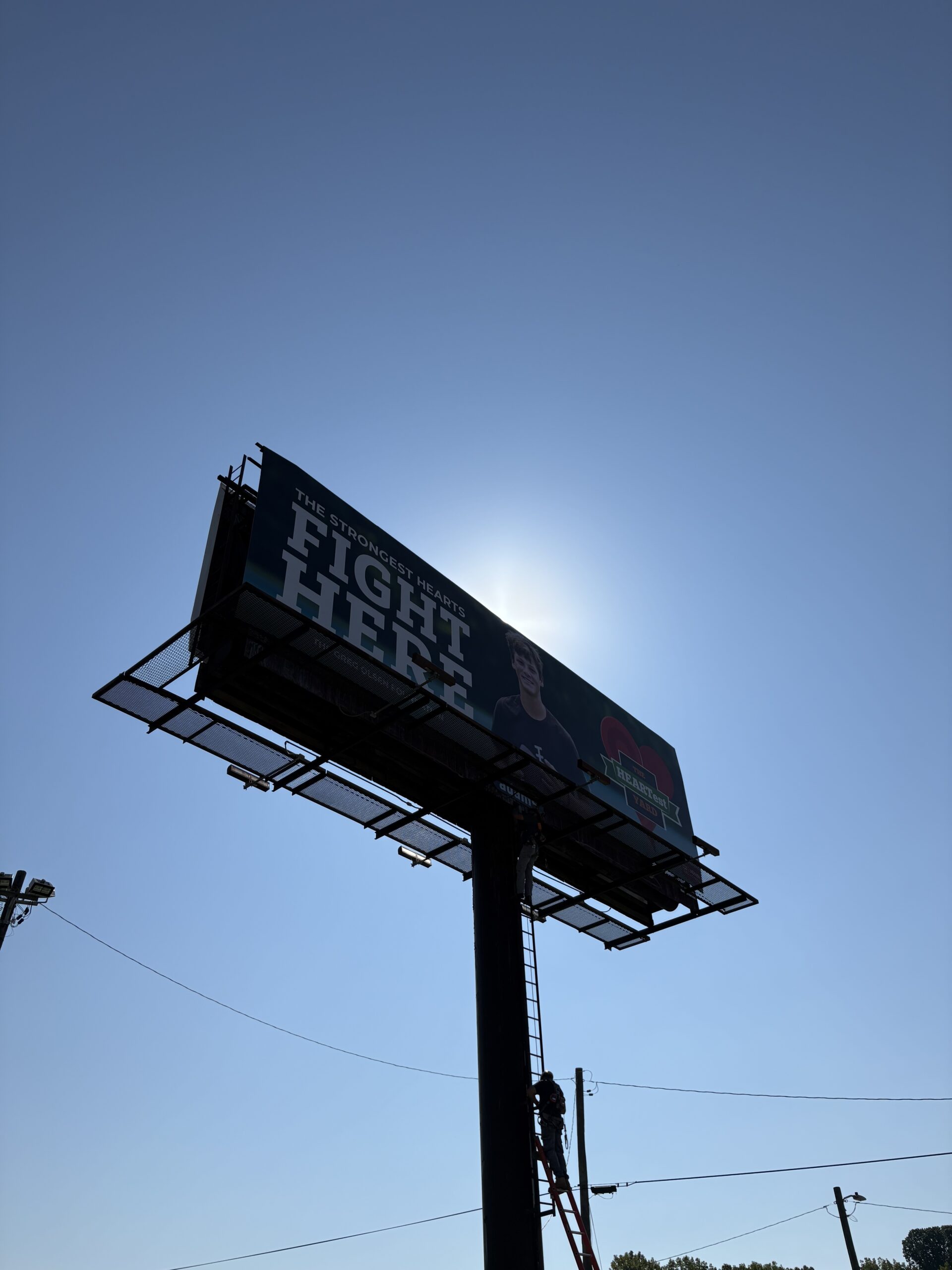 Greg and Kara Olsen’s non profit unveils new billboard campaign in partnership with Adams Outdoor