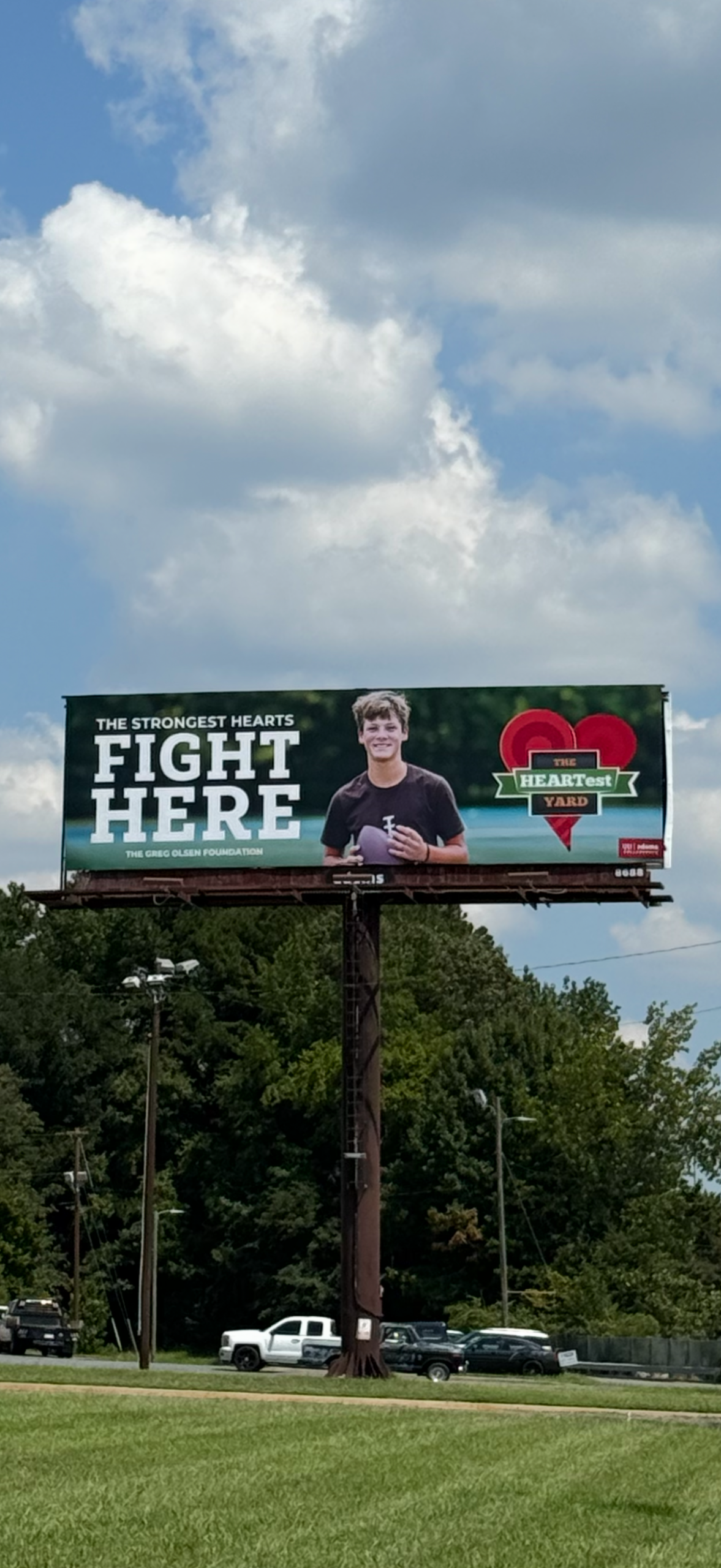 The HEARTest Yard new billboards on display around CLT